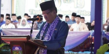 Wakil Gubernur Jambi, Abdullah Sani saat menyampaikan kata sambutan pada Pembukaan MTQ ke-19 Tingkat Kabupaten Tebo, bertempat di Lapangan Desa Karang Dadi, Kecamatan Rimbo Ilir Kabupaten Tebo, Jumat (05/05/2023). [Foto: Diskominfo/Harun]