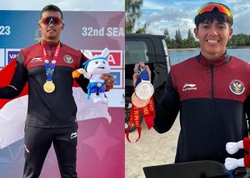 Dua Atlet Dayung asal Jambi, Subhi dan Joko saat mengangkat medali emasnya dalam SEA Games 2023 Kamboja. [Foto PODSI Provinsi Jambi]