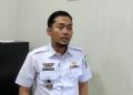 Kabag Hukum Pemerintah Kota Jambi, Gempa Awaljon saat ditemui di ruang kerjanya, Rabu (07/60/2023). [Dok. bitnews.id/Toy]