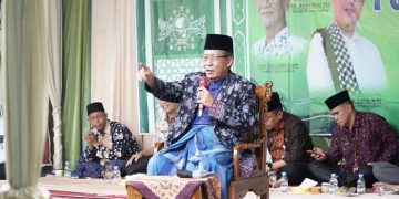Abdullah Sani saat mengahdiri Haflah Akhirussanah Ke- 53 Pondok Pesantren Darusy Syafi'iyah di Desa Kampung Pulau Kabupaten Batanghari, Kamis (15/06/2023). [Foto: Diskominfo/Harun]
