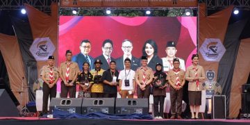 Peringatan Hari Indonesia Menabung 2023 yang digelar bersamaan dengan kegiatan Pramuka Raimuna Nasional XII 2023 di Bumi Perkemahan dan Graha Wisata Pramuka (Buperta) Cibubur, Jawa Barat pada Minggu, (20/08/2023). [Foto: Humas OJK]