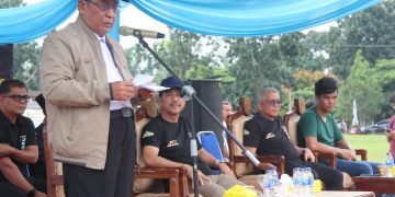 Wagub Sani saat membuka Even Kejuaraan Balap Motor Jambi Fun Race Tahun 2024 memperebutkan Piala Gubernur Jambi yang berlangsung di  Perkantoran Kabupaten Muaro Jambi, Bukit Cinto Kenang, Sabtu (22/06/2024). (Foto: Diskominfo/Agus)