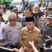 Gubernur Haris saat melepas keberangkatan mudik gratis di Terminal Tipe A Alam Barajo, Kota Jambi, Sabtu (14/03/2026). (Foto: Diskominfo/Novriansah)